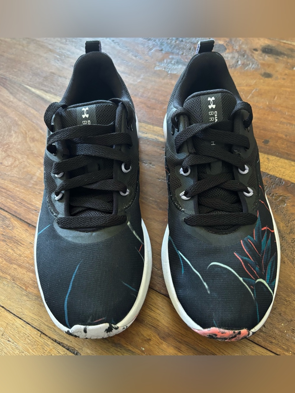 Under Armour Women’s Black Athletic Sneakers with Blue and Coral Floral Accents
